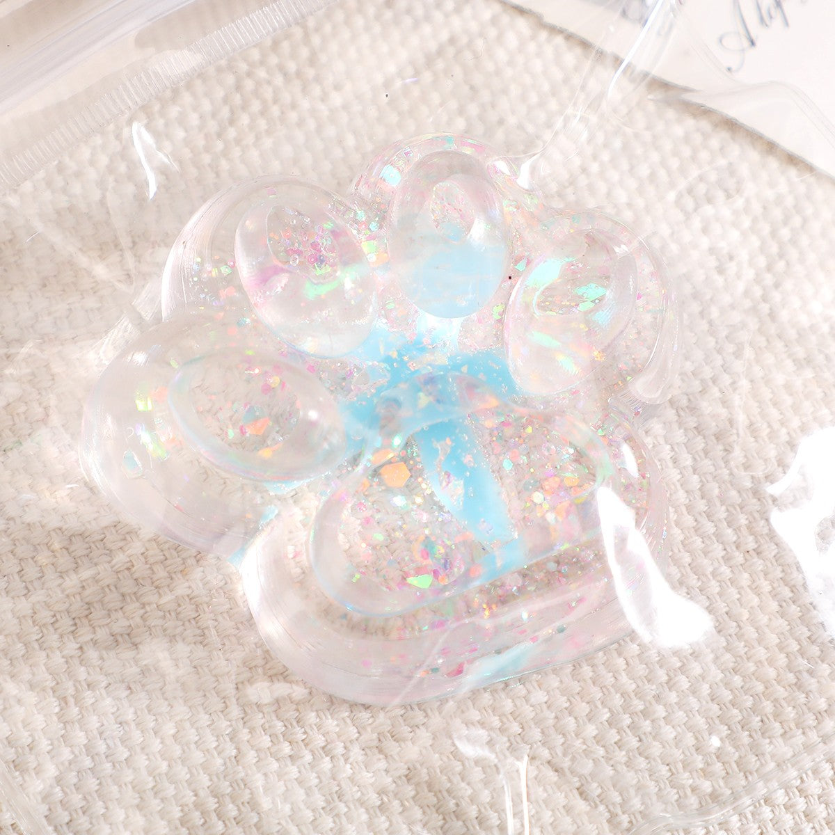 Jucarie Antistres Squishy, Vivimall, cu Revenire Lenta, Squeeze Pinch Family, Model Cat Paw, 6.5 x 7 cm, din Tpr, 4-6 Ani, Model 2 Flori, Transparent - vivimall.ro