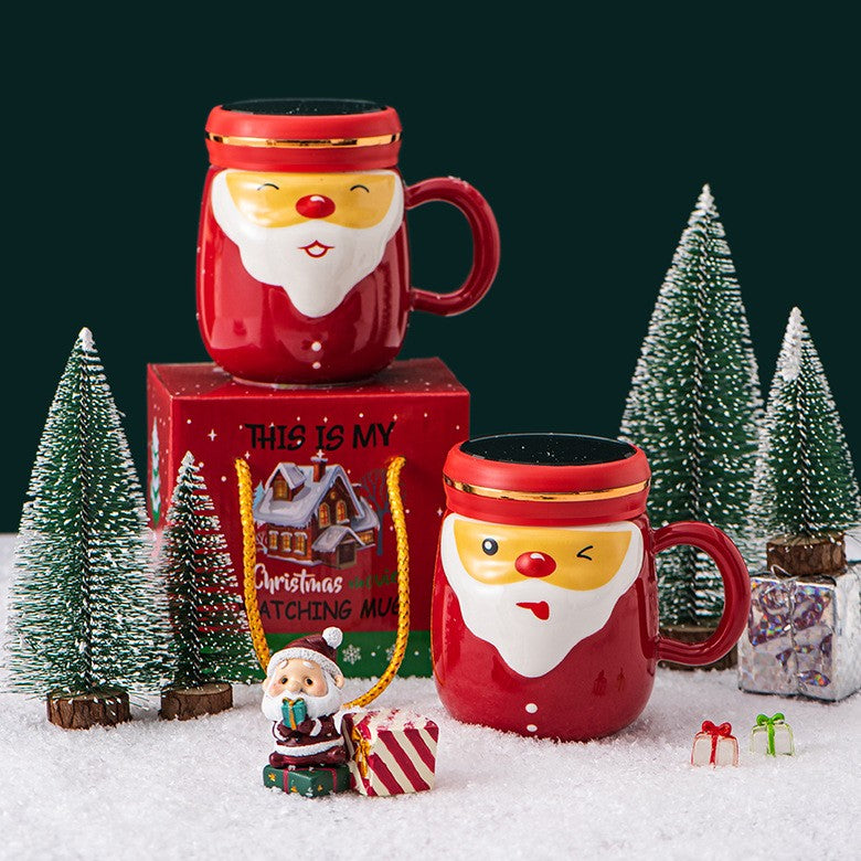 Cana Ceramica tematica Mos Craciun Vivimall, 430 ml, capac tip oglinda, ambalaj cadou inclus, fete random, 8 x 11.5, rosu - vivimall.ro