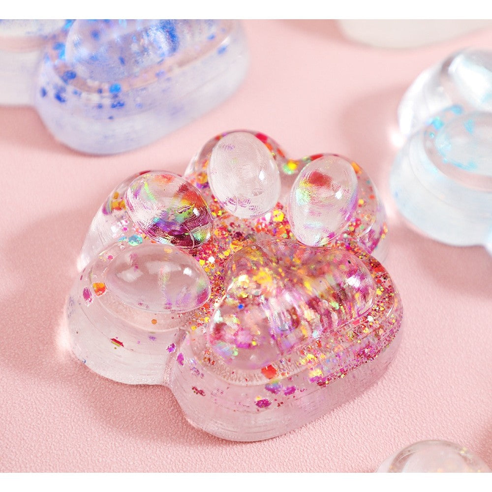 Jucarie Antistres Squishy, Vivimall, cu Revenire Lenta, Squeeze Pinch Family, Model Cat Paw, 6.5 x 7 cm, din Tpr, 4-6 Ani, Model 4 Sclipici, Transparent - vivimall.ro