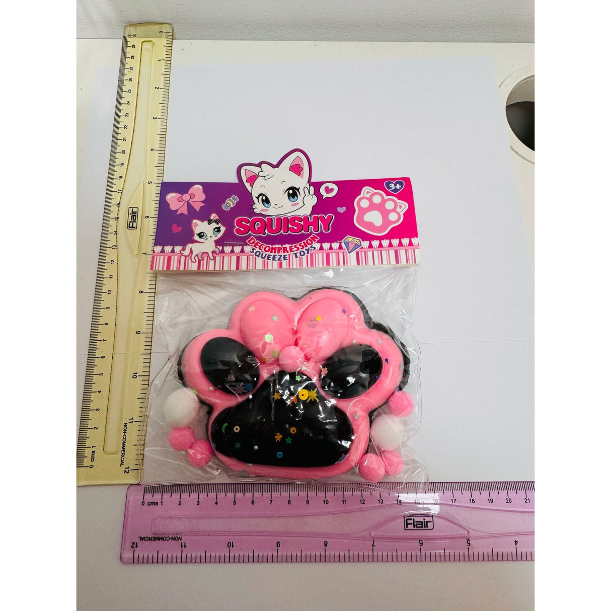 Jucarie Antistres Squishy, Vivimall, cu Revenire Lenta, Model Labuta de Pisica, cu Stelute, 12 cm, 220g, Pinch Family, Ambalaj Transparent, Roz Negru - vivimall.ro