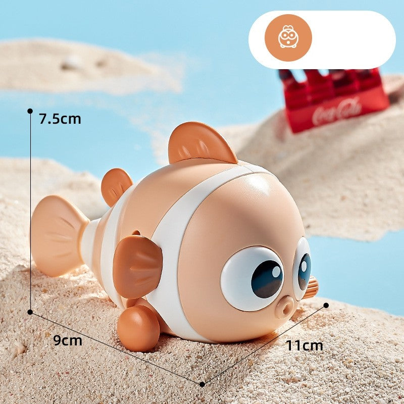 Jucarie mecanica pentru copii Vivimall, pestisor haios, cu cheita, distractiv, se taraste, se misca, 11 x 9 x 7.5 cm cm, portocaliu - vivimall.ro