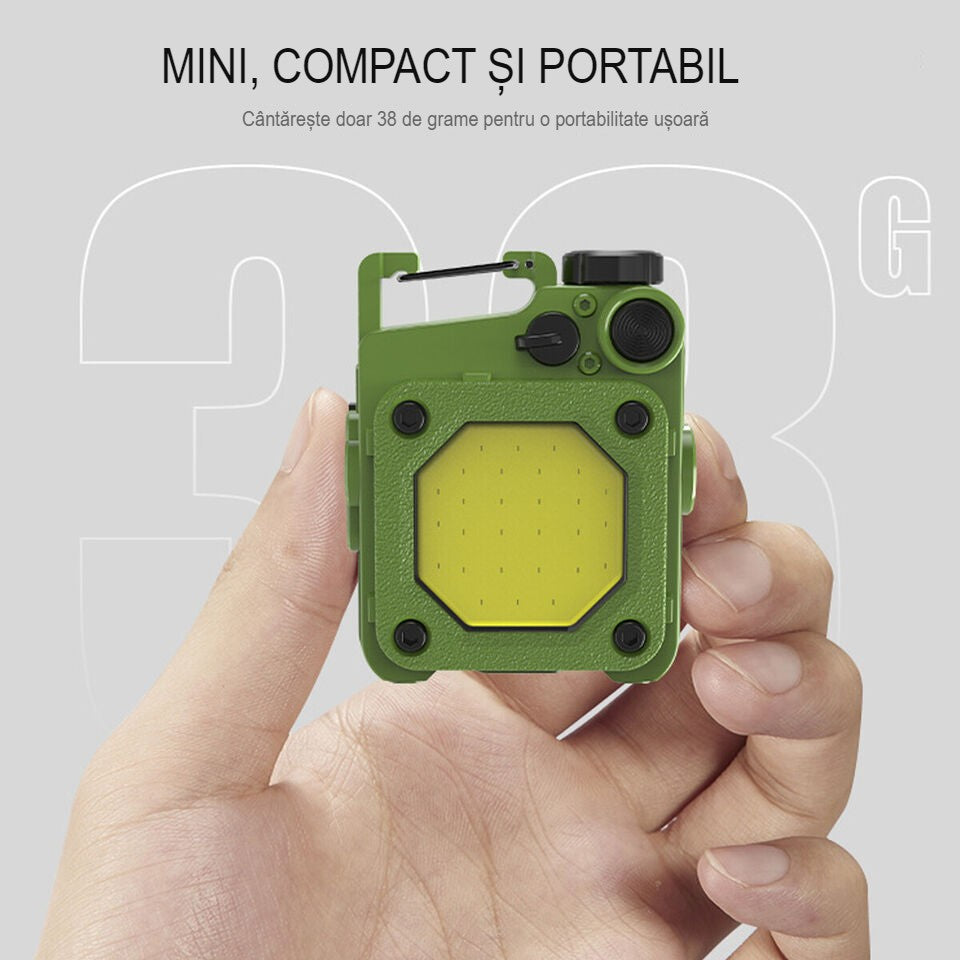 Magnet puternic integrat în baza lanternei mini Elvis verzi, fixat pe suprafață metalică