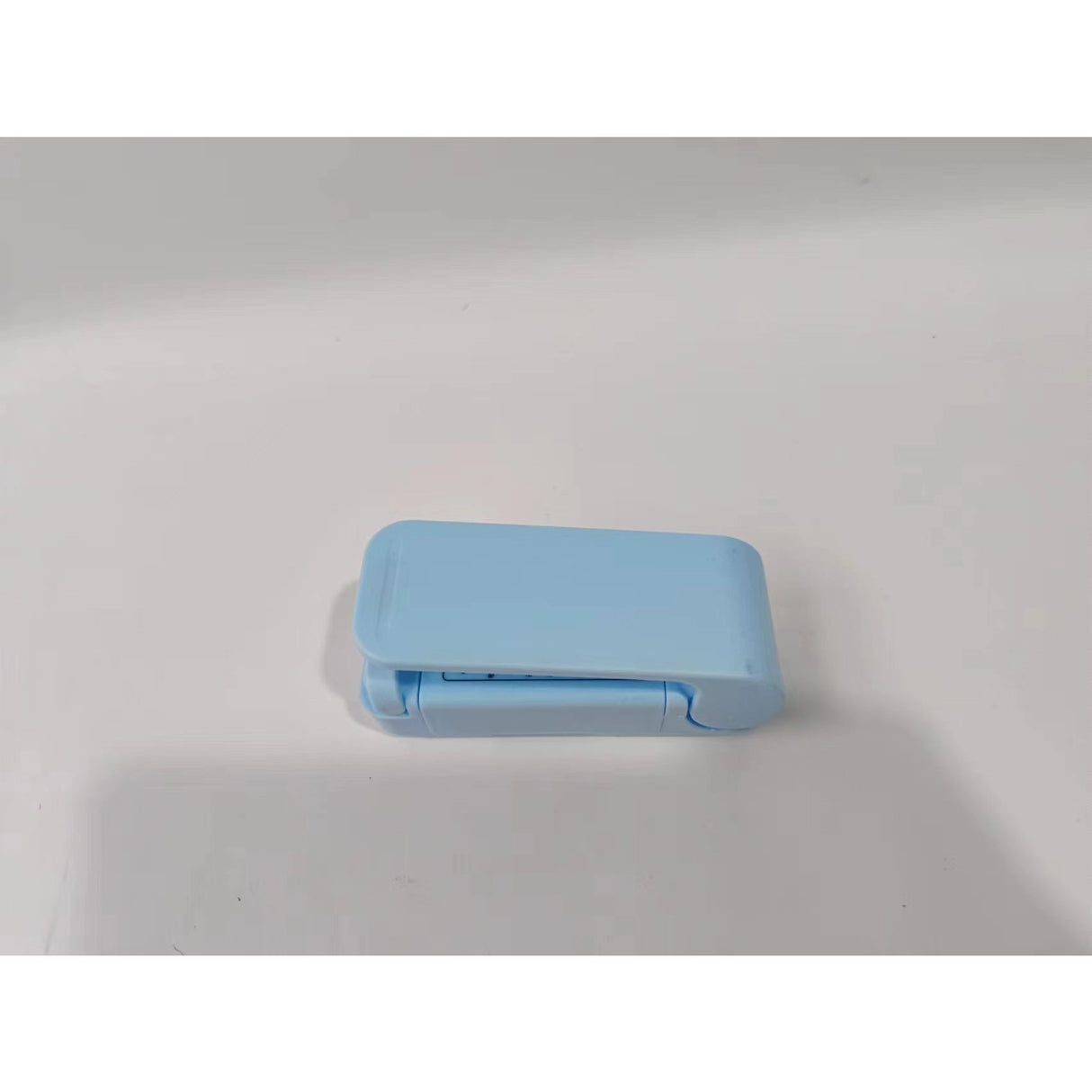 Mini Aparat de Sigilat Pungi cu Baterii, Vivimall, Etansare prin Caldura, Spate Magnetic, Portabil, 9.7x3 cm, Albastru - vivimall.ro