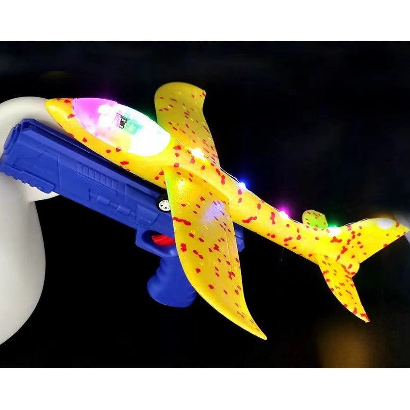 Pistol cu Lansator de Avion, Vivimall, din Polistiren+Plastic, +3 Ani, Avion 38 cm, Lansare 10 m, cu Lumini si Roti, Galben/Albastru - vivimall.ro