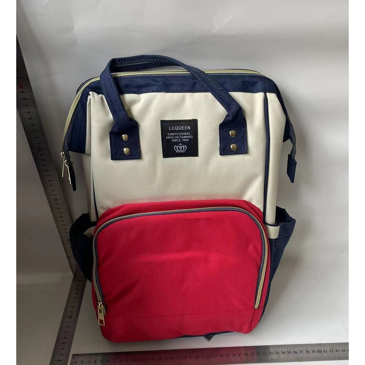 Rucsac Multifunctional pentru Mamici, Vivimall, din Panza Oxford, Compartimentare Multipla, Impermeabil, 43 x 18 x 26 cm, Alb/Rosu/Albastru - vivimall.ro