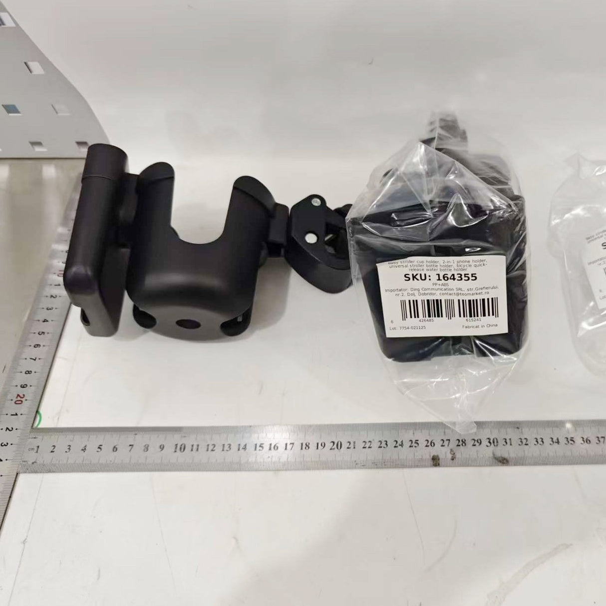 Suport pahar și telefon negru, vedere spate, sistem articulat cu rotire completă 360°