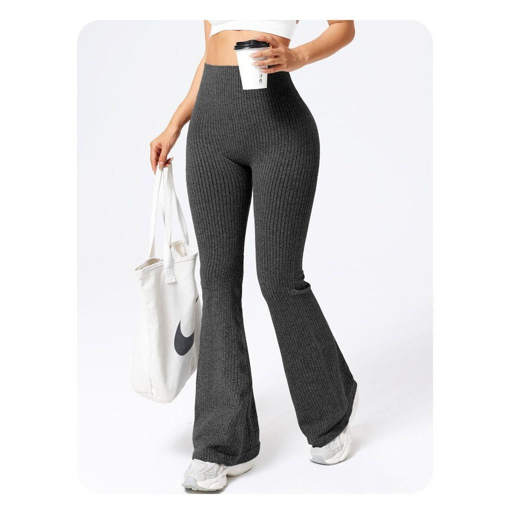 Pantaloni evazați sport damă negri, detaliu nervuri țesătură, potriviți pentru fitness și yoga