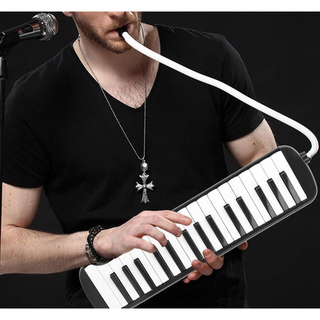 Detaliu clape imprimate cu note muzicale la melodica Vivimall 32 clape, material ABS ecologic