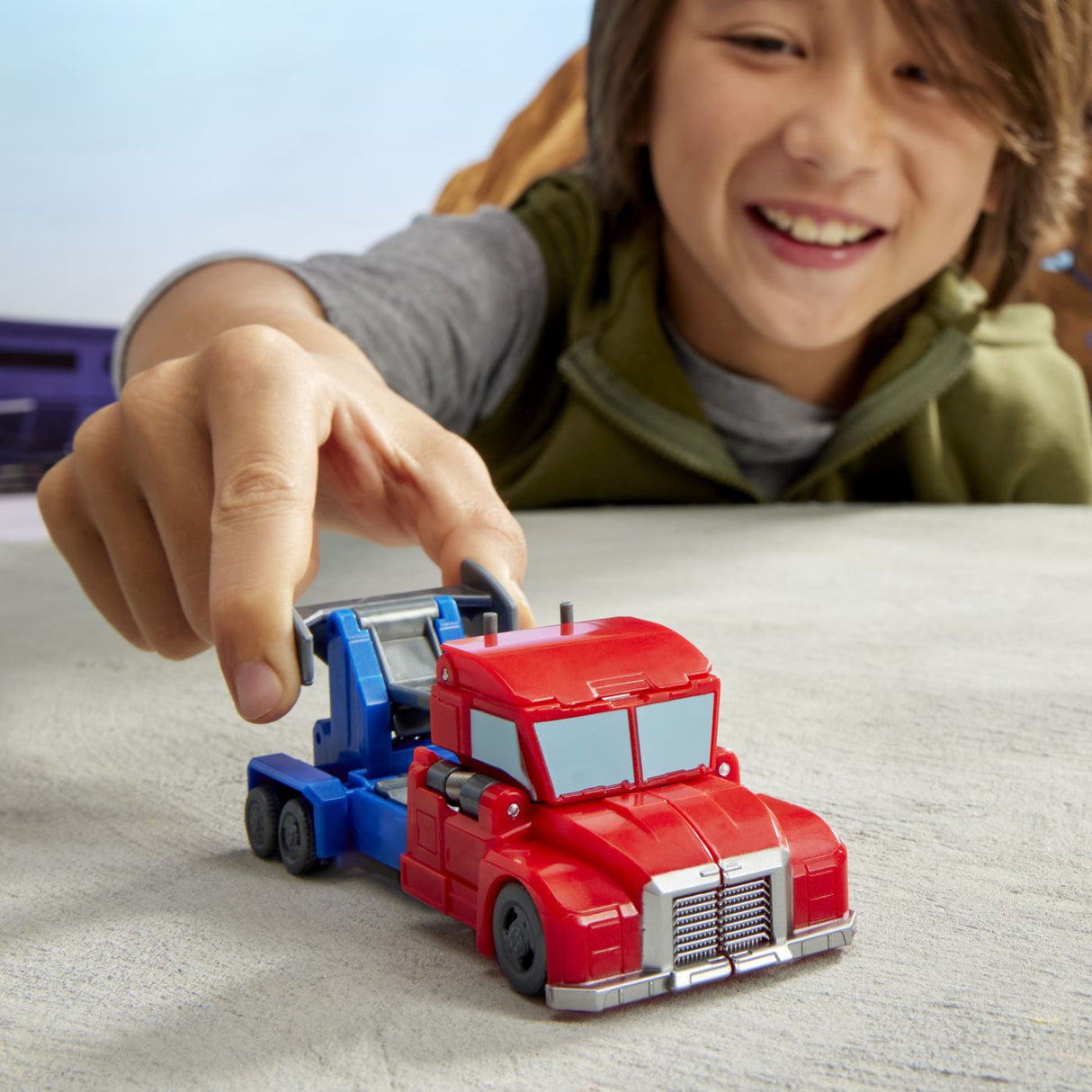 TRANSFORMERS EARTHSPARK FIGURINA OPTIMUS PRIME 1 STEP SMASH TO CHANGE
