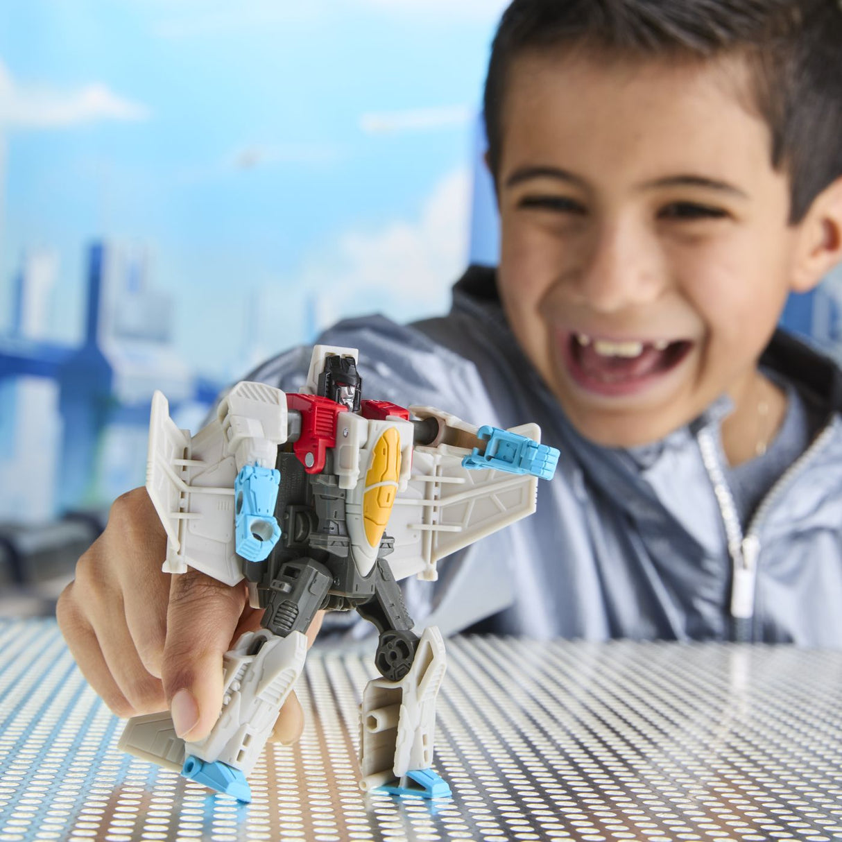 TRANSFORMERS CYBERWORLD ROBOT STARSCREAM CONVERTIBIL 10CM