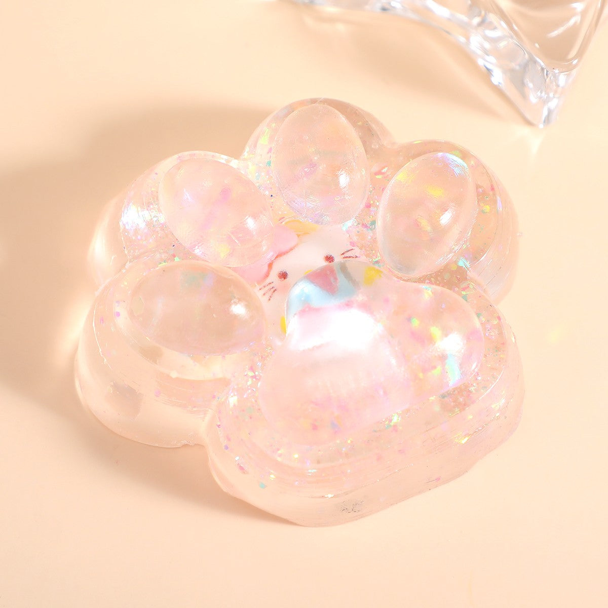 Jucarie Antistres Squishy, Vivimall, cu Revenire Lenta, Squeeze Pinch Family, Model Cat Paw, 6.5 x 7 cm, din Tpr, 4-6 Ani, Model 1 Figurina, Transparent - vivimall.ro