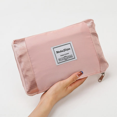 Geanta Pliabila, Vivimall, pentru Voiaj, Buzunare Multiple, de Mana, Impermeabila, Material Textil, Capacitate 8 Kg, Dimensiune Deschisa 42x28x10 cm, Roz - vivimall.ro