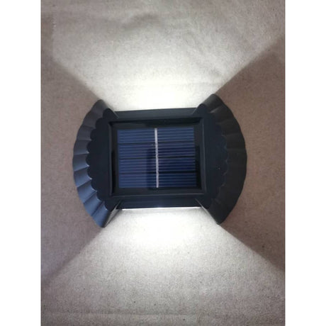 Set 4 Aplica solara LED bidirectionala pentru perete Vivimall, in forma de funda, 8 LED-uri, material ABS si PC, lumina puternica, IP65, 10 x 7.5 cm, baterie 1.2 V, 300 mAh, autonomie 8-10 ore, alb rece - vivimall.ro