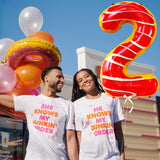 Balon din Folie Metalizata Vivimall, Figurina Cifra, Imprimeu Gogosi, Tema Aniversare 100 cm, Ambalaj Individual, Pai inclus, Umflare cu Aer sau Heliu, Multicolor, Cifra 2 - vivimall.ro