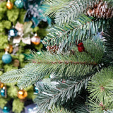 Műfenyő, piros fenyőtobozokkal díszítve, beltérre és kültérre, magasság 150 cm, átmérő 104 cm, 323 ág, fém talppal