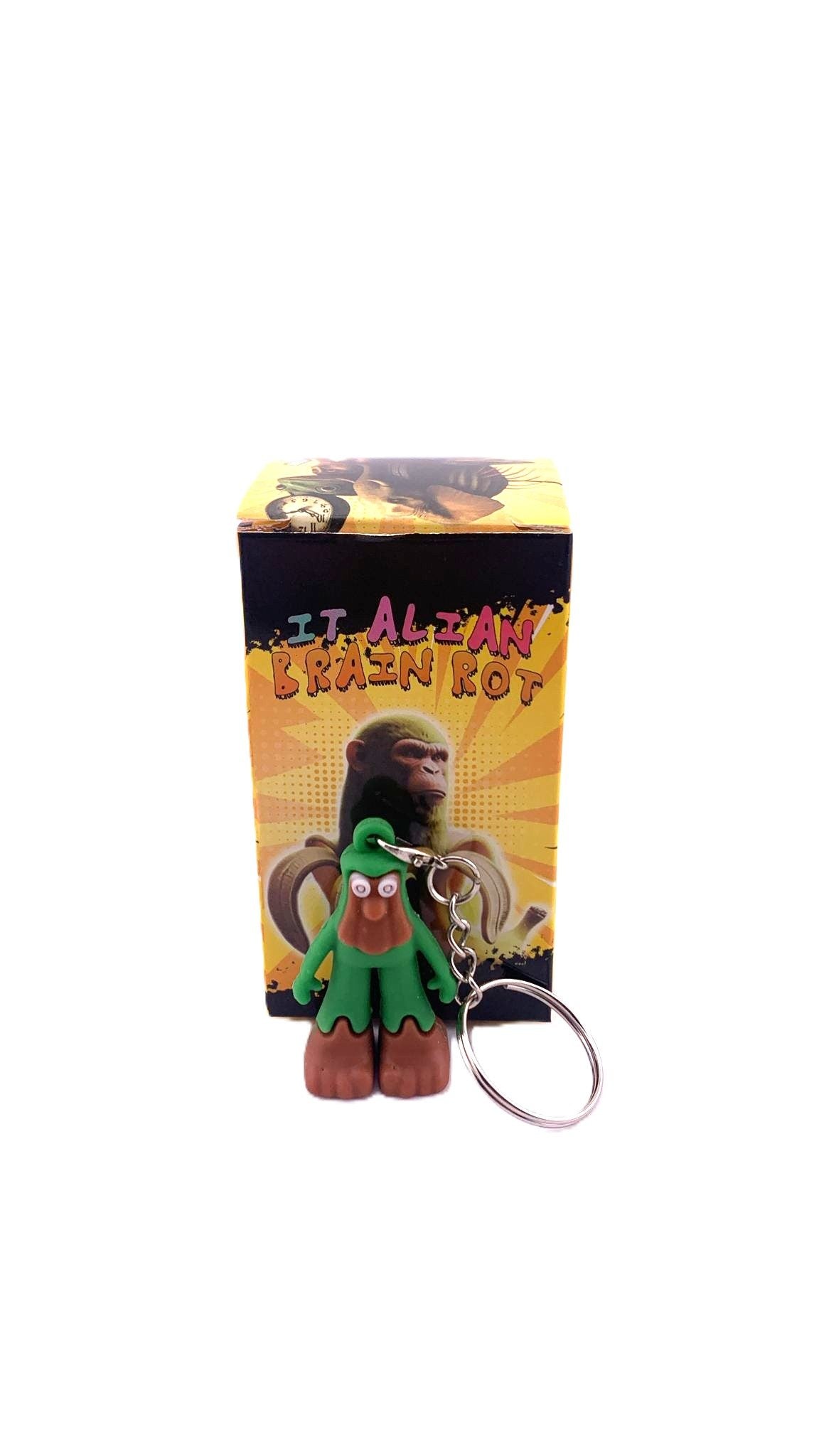 Figurină breloc silicon Brainrot Brr Brr Patapim de 4 cm, vedere laterală, culori verde și maro, brand Flippy