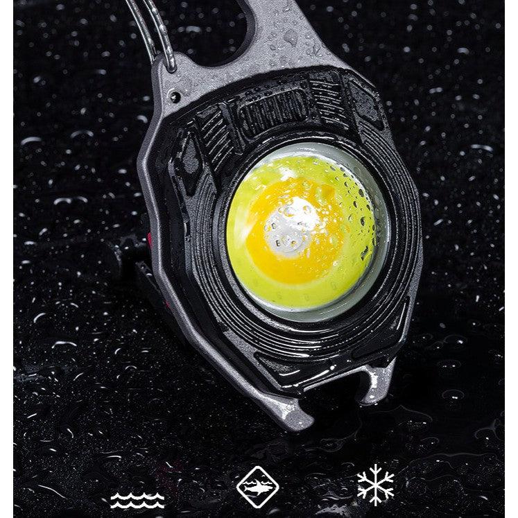 Breloc Multifunctional, Vivimall, Model W5147, Kit Supravietuire, Lanterna, Bricheta, Fluier, din ABS/Aluminiu, Alimentare USB, Negru/Portocaliu - vivimall.ro