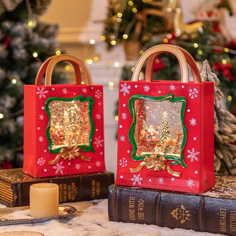 Decoratiune de Craciun, Vivimall, Model Sacosa Cadou cu Mos Craciun si Ren, Iluminare LED si Efect Zapada, 23 x 15 x 7.3 cm, Rosu - vivimall.ro