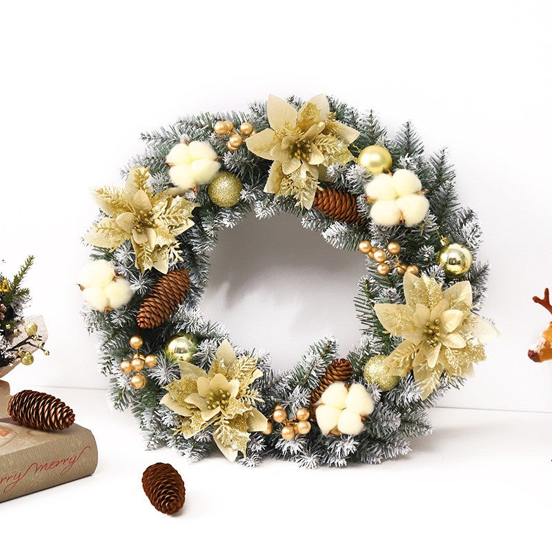 Karácsonyi koszorú 50 cm, műfenyőből, tobozokkal, golyókkal és virágokkal díszítve