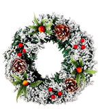 Karácsonyi koszorú, átmérője 20 cm, műfenyőből, tobozokkal és áfonyával díszítve, havas, /fehér