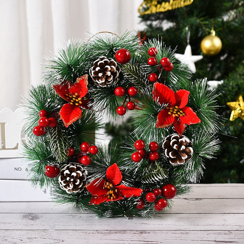 Karácsonyi koszorú, átmérője 32 cm, műfenyőből, tobozokkal és áfonyával díszítve, 3 piros masnival. /Fehér