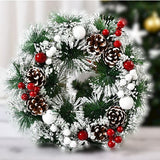 Karácsonyi koszorú, átmérője 32 cm, műfenyőből, tobozokkal és áfonyával díszítve, havas. / Fehér.