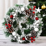 Karácsonyi koszorú, átmérője 32 cm, műfenyőből, tobozokkal és áfonyával díszítve, havas. / Fehér.