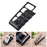 Organizator birou negru din plastic văzut din lateral, design compact de 18x7x9 cm fără instalare