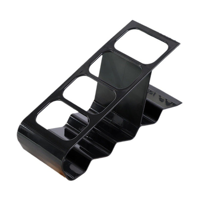 Organizator de birou din plastic negru cu 4 compartimente pentru telecomenzi și telefoane, vedere frontală
