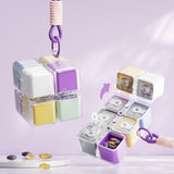 Organizator medicamente Flippy Rubik Cube, detaliu curea agățare și dimensiuni compacte