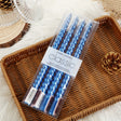 Set 4 lumânări răsucite albastre de 25 cm pentru masă și decor, vedere frontală ansamblu