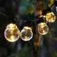 Sir luminos liniar de Crăciun cu bulb decorativ alb-cald, detaliu LED aprins