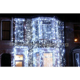 Instalatie Craciun Profesionala de Exterior IP65, Tip Perdea, 11m x 5m, 5500 Led-uri Mari, Alb rece, cu flash, Alimentator si prelungitor 6,5 m, Interconectabila, Fir negru, Vivimall - vivimall.ro
