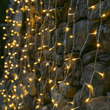 Instalatie Craciun, Tip Perdea, 1 m x 1 m, 60 LED-uri, Alb Cald, Controler, 8 jocuri de lumini, Interconectabila, Fir transparent, Interior/ Exterior, Vivimall - vivimall.ro