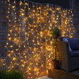 Instalatie Craciun, Tip Perdea, IP44, 9 m x 3 m, 720 LED-uri, Alb Cald, cu 8 jocuri de lumini, 31 V, 9W, Interconectabila, Prelungitor 3 m inclus, Fir transparent, Interior/ Exterior, Vivimall - vivimall.ro
