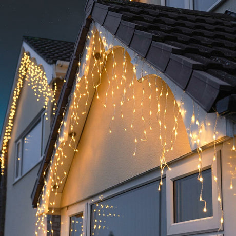 Instalatie Craciun Yoto, Tip Franjuri/Turturi, 4 m, 120 LED-uri, Prelungitor 1.5 m, 8 Jocuri de Lumini, Interconectabila, Conectare la Retea, Fir transparent, Interior/Exterior, Alb Cald - vivimall.ro