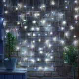 Instalatie Craciun Yoto, Tip Perdea, 2 m x 1 m, 120 LED-uri, Prelungitor 1.5 m, 8 Jocuri de Lumini, Interconectabila, Fir transparent, Interior/Exterior, Alb Rece - vivimall.ro