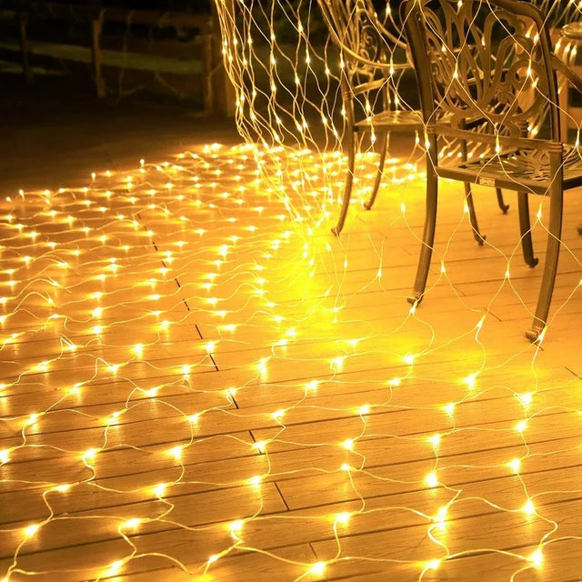 Instalatie Craciun Yoto, Tip Plasa, 1.2 m x 1.2 m, 80 LED-uri, Prelungitor 1.5 m, 8 Jocuri de Lumini, Interconectabila, Fir transparent, Interior/Exterior, Alb Cald - vivimall.ro