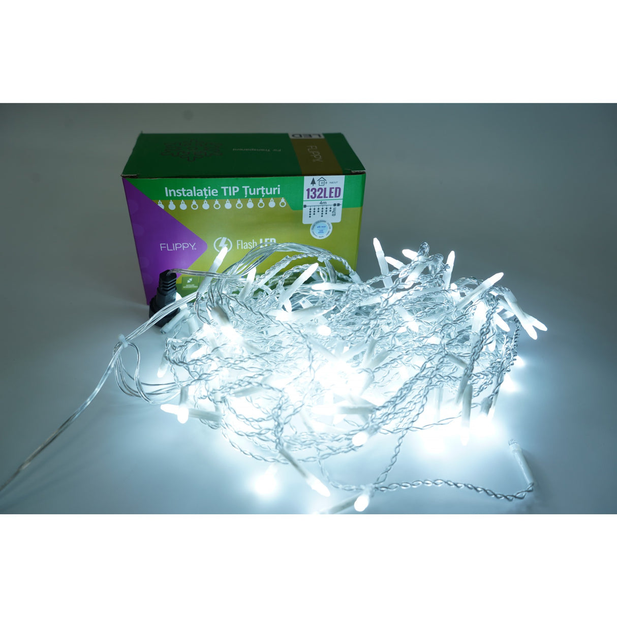 Instalație Crăciun Flippy tip țurțuri alb rece, 132 LED-uri pe secțiune de 4 m, fir transparent, vedere frontală