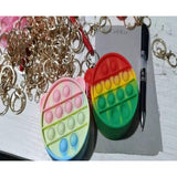 Jucarie Antistres din silicon Flippy, Pop It Now And Flip It, Portofel, 6 cm, Multicolor - vivimall.ro