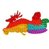 Jucarie Antistres, Vivimall, Tip Pop It Now and Flip It, Sania Lui Mos Craciun cu Renul, 42 x 21 cm, Multicolor - vivimall.ro