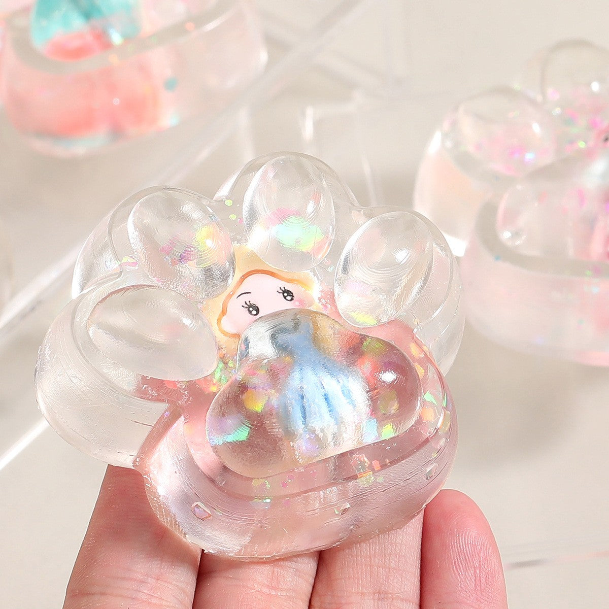 Jucarie Antistres Squishy, Flippy, Labuta de Pisica Pufoasa, cu Revenire Lenta, 7 x 6.5 cm, Model Printesa, Multicolor - vivimall.ro