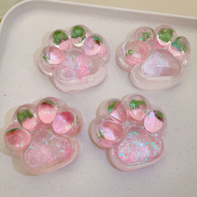 Jucarie Antistres Squishy, Vivimall, cu Revenire Lenta, Squeeze Pinch Family, Model Labuta de Pisica cu Sclipici, 6.5x6 cm, 60g, Ambalaj Transparent, Roz - vivimall.ro