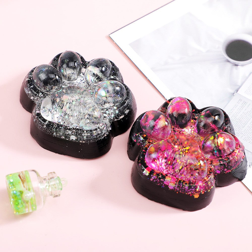 Jucarie Antistres Squishy, Vivimall, cu Revenire Lenta, Squeeze Pinch Family, Model Labuta de Pisica cu Sclipici, 6.5x6 cm, 60g, Ambalaj Transparent, Alb-Negru - vivimall.ro