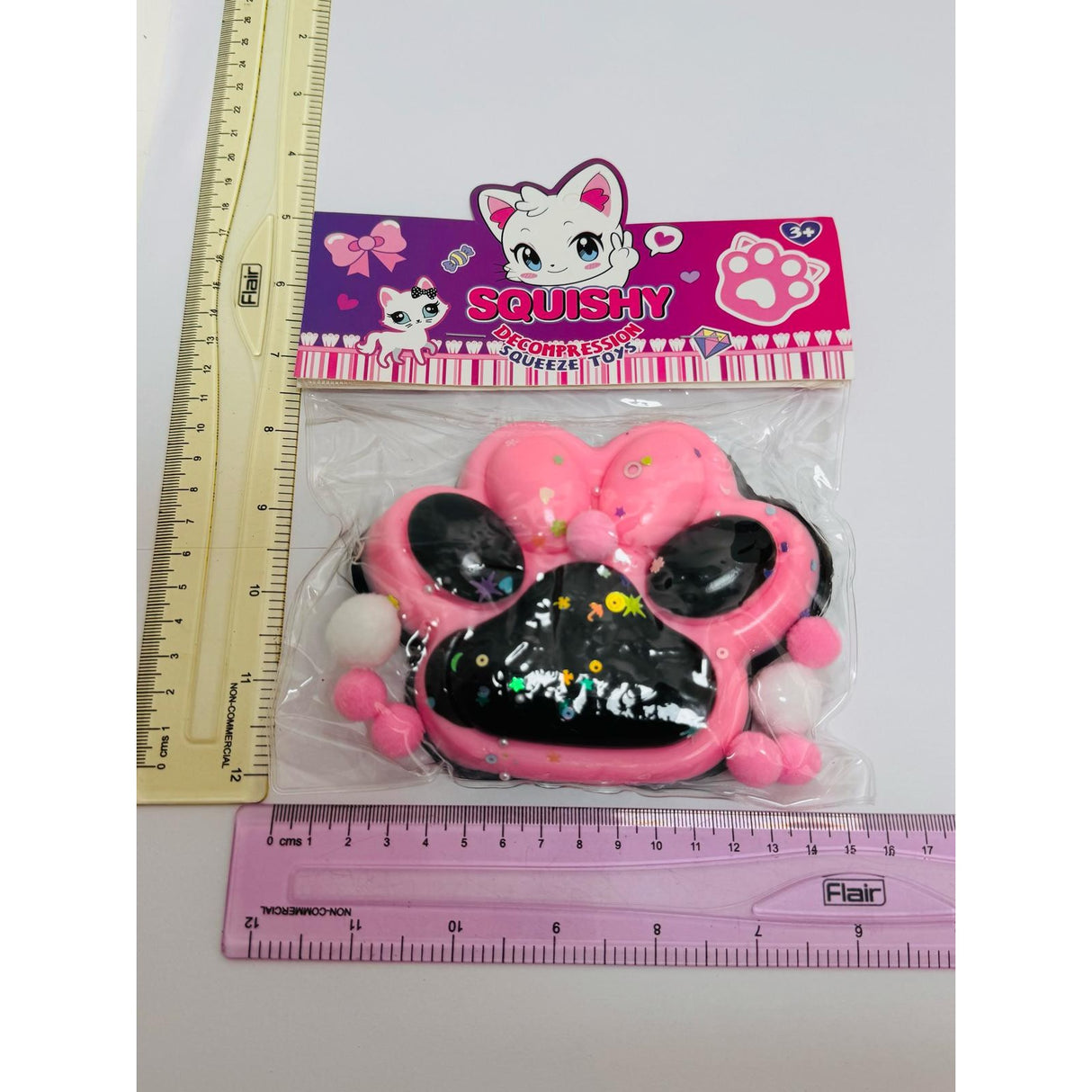 Jucarie Antistres Squishy, Vivimall, cu Revenire Lenta, Model Labuta de Pisica, cu Stelute, 12 cm, 220g, Pinch Family, Ambalaj Transparent, Roz Negru - vivimall.ro