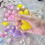 Jucarie Antistres Squishy, Vivimall, cu Revenire Lenta, Labuta de Pisica Pufoasa, 12.5x10.5 cm, Ambalaj Transparent, Model 6, Multicolor - vivimall.ro