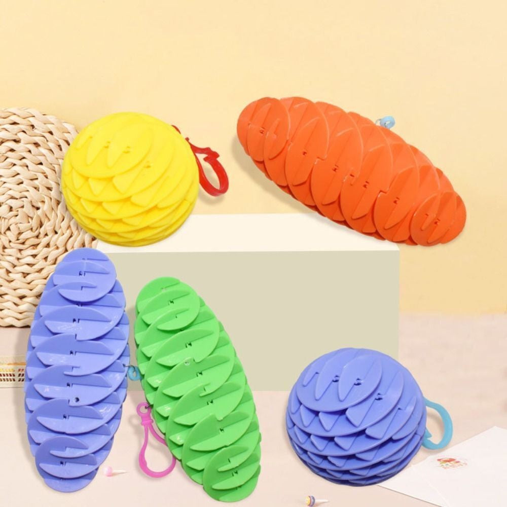 Jucarie Worm Fidget de Decompresie, Vivimall, Anti Stres, Dimensiune Compacta 6 cm, Dimensiune Extinsa 15.5 cm, Albastru eschis - vivimall.ro