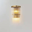 Aplică de perete din inox auriu și cristal transparent, 43×25 cm, vedere frontală, lumină caldă activată