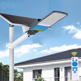 Lampa solara stradala Vivimall, IP66, senzor de lumina, 120 LED-uri SMD, 1800 lm, panou 20W, putere 100W, autonomie 12-16 ore, telecomanda, montare prin fixare, pentru strada sau gradina, finisaj mat, material ABS,  49 x 21 x 5.5 cm, gri - vivimall.ro