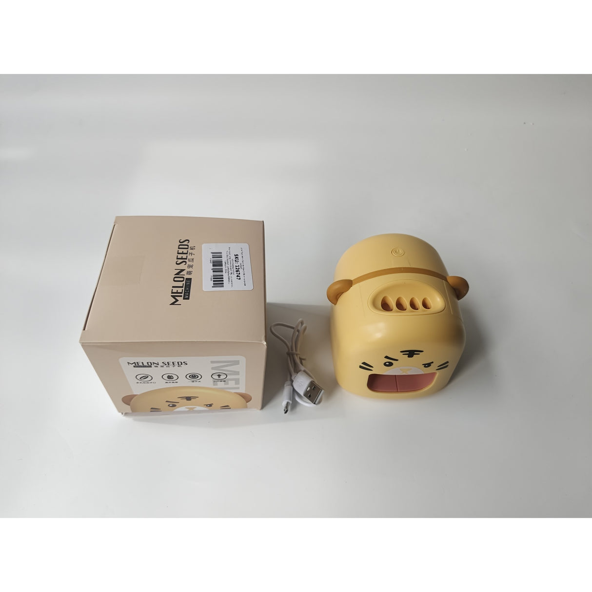 Mașină de Decojit Semințe, Vivimall, Mini Deschizător, Model Tigru, Incarcare USB, 9.7x10x8.6 cm, Portocaliu - vivimall.ro